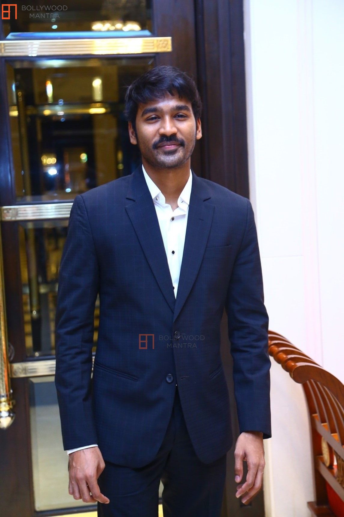 dhanush coat suit